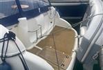 Gobbi 345SC - 2005 Gobbi 345SC yacht with wooden deck and mooring ropes.