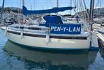 Westerly Merlin - 1986 Westerly Merlin sailboat named "Pen-Y-Lan" docked in a marina.