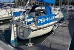 Westerly Merlin - 1986 Westerly Merlin sailboat named "Pen-Y-Lan" docked at a marina.