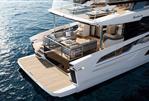 Absolute Navetta 66 - Luxurious 2026 Absolute Navetta 66 yacht with elegant deck and modern seating area.