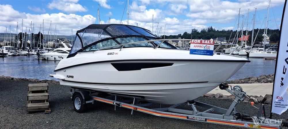 Flipper 650 DC - 2023 Flipper 650 DC boat for sale on trailer at marina.