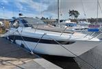 Galeon 405 HTS - 2023 Galeon 405 HTS yacht docked, for sale sign visible.