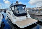 Galeon 405 HTS - 2023 Galeon 405 HTS yacht docked in a marina, showcasing sleek design and modern features.