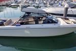 Greenline Neo - 2018 Greenline Neo boat docked in marina, featuring sleek design and modern amenities.