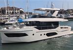 Absolute Navetta 53 - 2025 Absolute Navetta 53 yacht docked in a marina, showcasing sleek design and modern features.