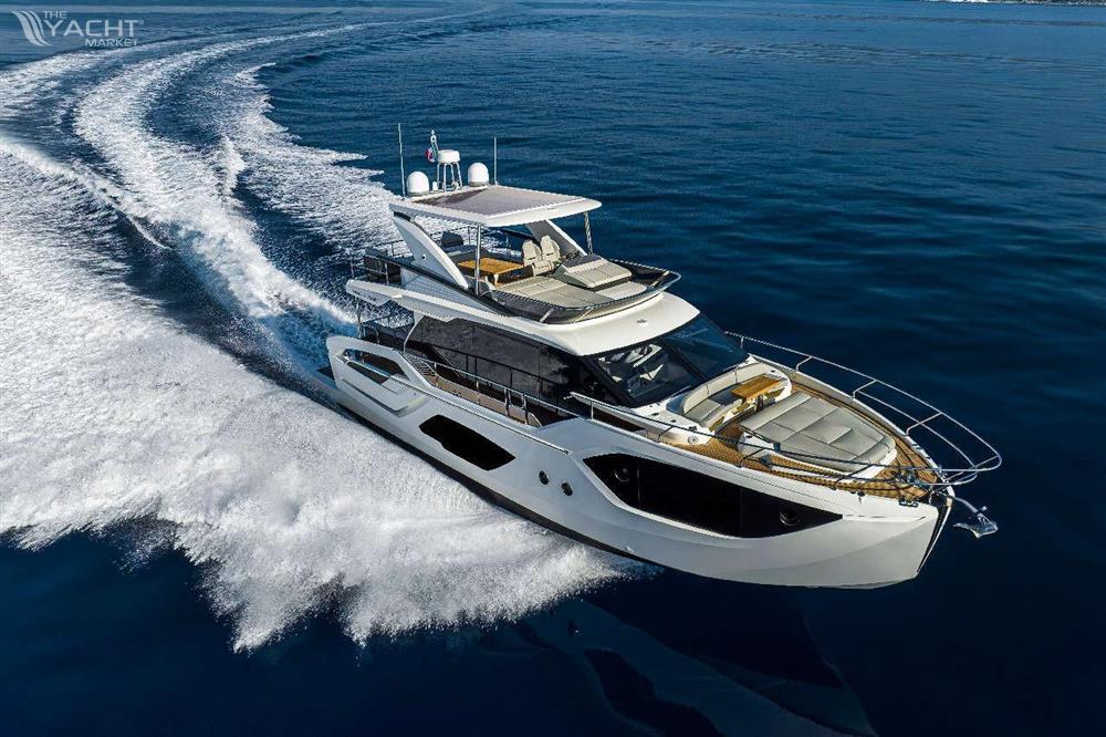 Absolute 52 FLY - Luxurious 2025 Absolute 52 FLY yacht cruising on open water.