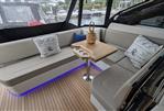 Fairline Targa 45 GT - Luxurious seating area on 2025 Fairline Targa 45 GT yacht with elegant cushions and table.