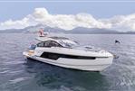 Fairline Targa 40 - 2025 Fairline Targa 40 yacht cruising on open water with mountainous backdrop.