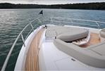 Fairline Squadron 58 - Luxury Fairline Squadron 58 yacht deck, 2025 model, with elegant seating and scenic water view.