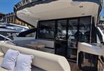 Fairline Targa 45 GT - 2022 Fairline Targa 45 GT yacht with spacious deck and modern design in marina setting.