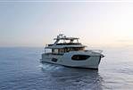 Absolute NAVETTA 70 - Luxury Absolute NAVETTA 70 yacht cruising at sunset, 2026 model, on calm ocean waters.