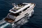 Nimbus 495 Flybridge - Nimbus 495 Flybridge 2026 yacht cruising on open water, aerial view.