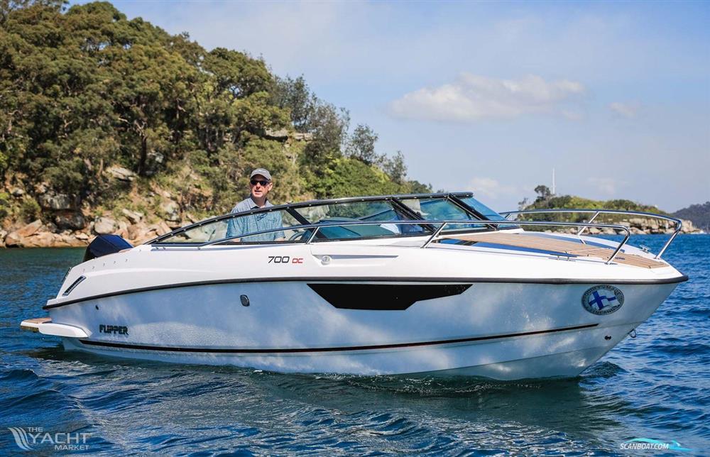 Flipper 700 DC - Flipper 700 DC boat cruising on a sunny day, 2026 model.