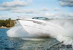 Flipper 650 DC - 2026 Flipper 650 DC speedboat cruising on a lake, creating dynamic water splashes.