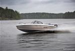 Falcon BR 7 - 2026 Falcon BR 7 speedboat cruising on a serene lake with forested shoreline.