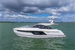 Fairline Targa 40 - 2026 Fairline Targa 40 yacht cruising on open water under cloudy skies.