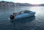 Fairline F//Line 33 Outboard - 2026 Fairline F//Line 33 Outboard cruising on serene waters near a coastal town.