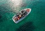 Fairline F//Line 33 - 2026 Fairline F//Line 33 yacht cruising on clear turquoise waters.