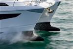 Aquila 70 Luxury - Aquila 70 Luxury yacht cruising on water, 2026 model, sleek design.