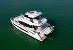 Aquila 54 Yacht - Aquila 54 Yacht 2026 cruising on open water, showcasing sleek design and luxury features.