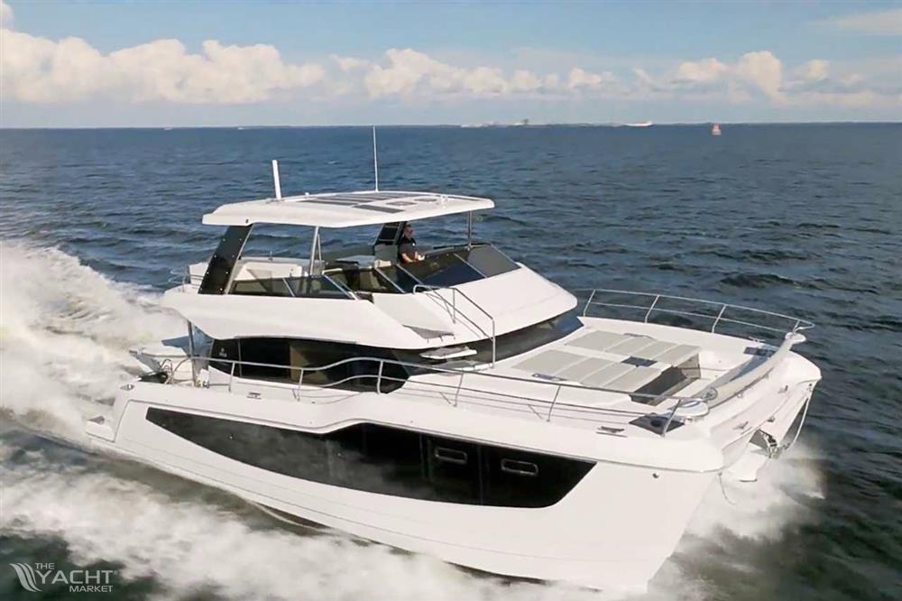 Aquila 50 Power Catamaran - 2026 Aquila 50 Power Catamaran cruising on open water under a clear sky.