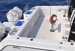 Aquila 47 Molokai - Aquila 47 Molokai 2026 boat deck with seating and dual outboard motors.