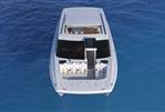 Aquila 46 COUPE - Aquila 46 Coupe 2026 yacht on clear blue water, aerial view.