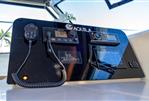 Aquila 42 Yacht - Control panel of 2026 Aquila 42 Yacht with communication devices and navigation display.