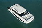 Aquila 42 Coupe - Aquila 42 Coupe 2026 yacht on calm water, aerial view.