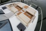 Aquila 36 Sport - Aquila 36 Sport 2026 boat deck with cushioned seating and wooden flooring.