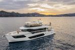 Absolute NAVETTA 75 - Luxury yacht Absolute NAVETTA 75 cruising at sunset, 2026 model.