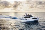 Absolute Navetta 68 - Luxury yacht Absolute Navetta 68 cruising on open sea at sunset, 2026 model.