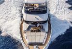 Absolute Navetta 68 - 2026 Absolute Navetta 68 yacht cruising on open water, top view.