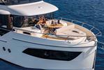 Absolute Navetta 53 - 2026 Absolute Navetta 53 yacht with luxurious deck seating on open water.