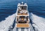 Absolute Navetta 53 - 2026 Absolute Navetta 53 yacht cruising on open sea, showcasing luxurious deck design.