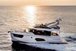 Absolute NAVETTA 48 - 2026 Absolute NAVETTA 48 yacht cruising at sunset on open sea.