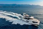 Absolute NAVETTA 48 - Luxury yacht Absolute NAVETTA 48 cruising on open sea, 2026 model.