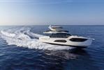 Absolute 60 Fly - Luxury yacht Absolute 60 Fly 2026 cruising on open sea under clear sky.