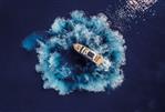 Absolute 60 Fly - Aerial view of 2026 Absolute 60 Fly yacht creating circular waves in deep blue water.