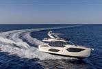 Absolute 56 FLY - Luxury Absolute 56 FLY yacht cruising on open sea, 2026 model.