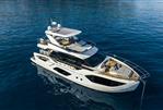 Absolute 52 FLY - Luxurious 2026 Absolute 52 FLY yacht cruising on serene blue waters.