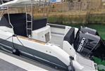 Galeon Galia 770 Sundeck - 2022 Galeon Galia 770 Sundeck boat with Suzuki outboard engine docked in marina.