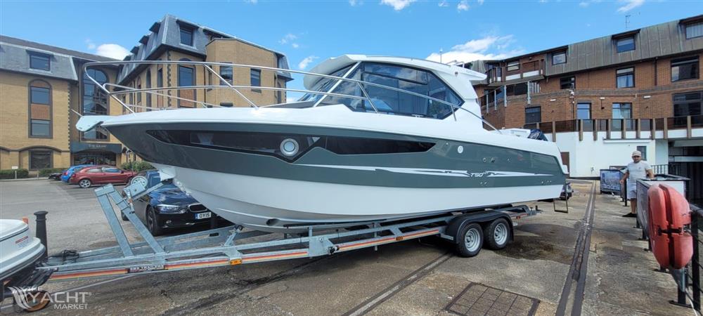 Galeon Galia 750 Hardtop - 2022 Galeon Galia 750 Hardtop boat on trailer in urban setting.