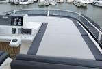 Galeon 550 Fly - 2017 Galeon 550 Fly yacht's spacious flybridge with helm and seating area.