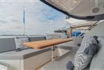 Galeon 485 HTS - Luxurious 2022 Galeon 485 HTS yacht with elegant outdoor seating and stylish cushions.