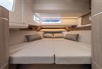 Galeon 335 GTO - Luxurious interior cabin of 2025 Galeon 335 GTO yacht with cozy bedding.