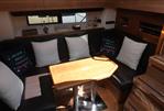 Sealine SC42 - 2013 Sealine SC42 yacht interior with cozy seating and decorative pillows.