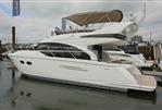 Princess 43 - Luxury 2017 Princess 43 yacht docked at marina, showcasing sleek design and elegance.