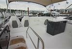Princess 43 - Luxurious 2017 Princess 43 yacht interior with seating and helm, docked at marina.