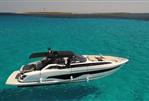 Sunseeker Superhawk 55 - 2024 Sunseeker Superhawk 55 yacht cruising on clear turquoise waters.